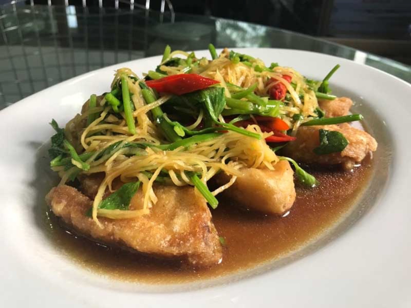 Southern Thai Crispy Sea Bass with Chinese Celery, Ginger, and Crab Paste